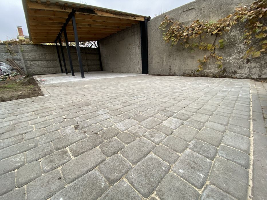 Укладання тротуарної плитки фем бруківка Укладка тротуарной плитка фэм