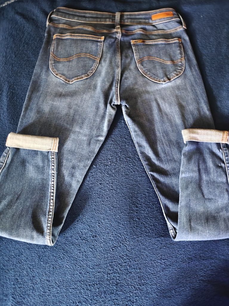Damskie spodnie jeansowe Lee jak nowe