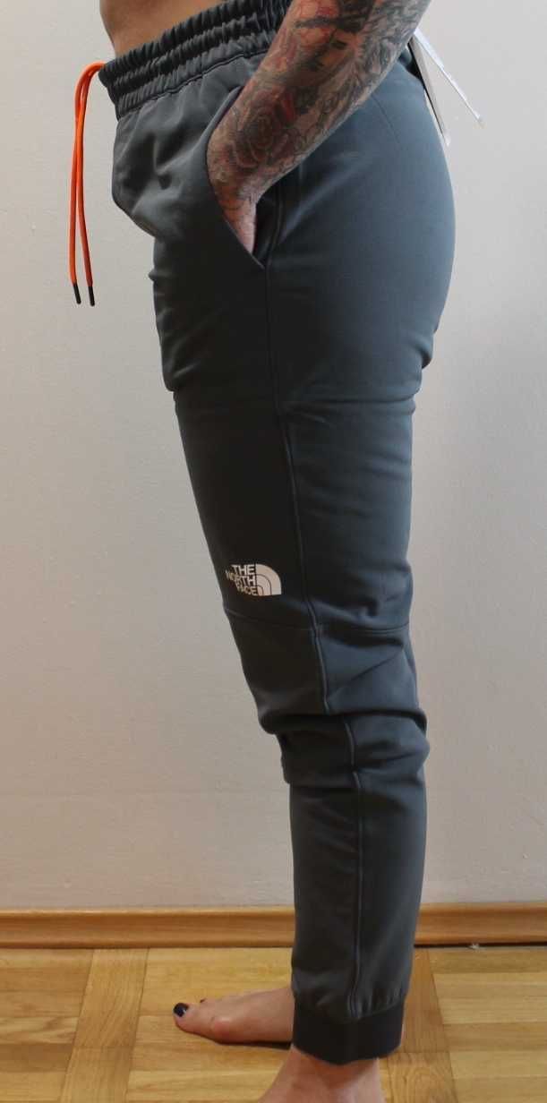 39. The North Face - Tekware - Szare Polarowe Spodnie Joggersy. Nowe