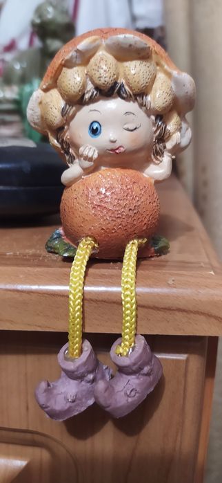 Фігурка дівчинка-мандаринка