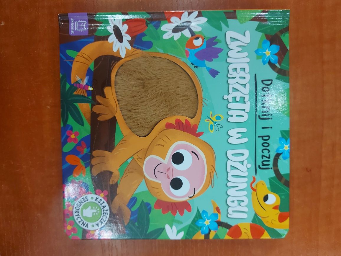 Książeczka sensoryczna "Dotknij i poczuj .Zwierzęta w dżungli ".