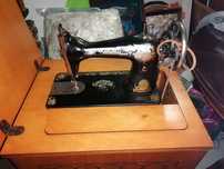 Máquina de costura da Singer a precisar de restauro