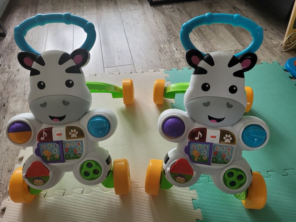 Sprzedam dwa pchacze-chodziki FISHER PRICE język polski