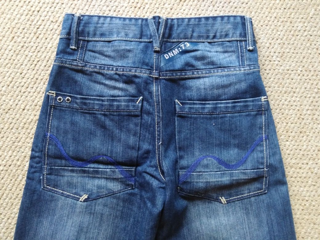 Spodnie dżinsy jak nowe na szczupłego chłopca r. 146-152 cm