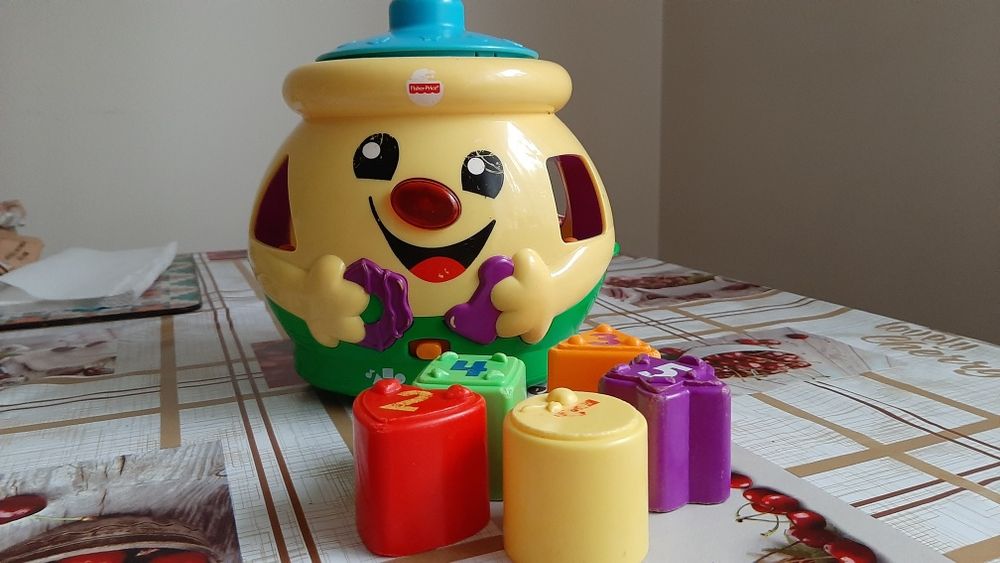 Fisher Price Garnuszek na klocuszek