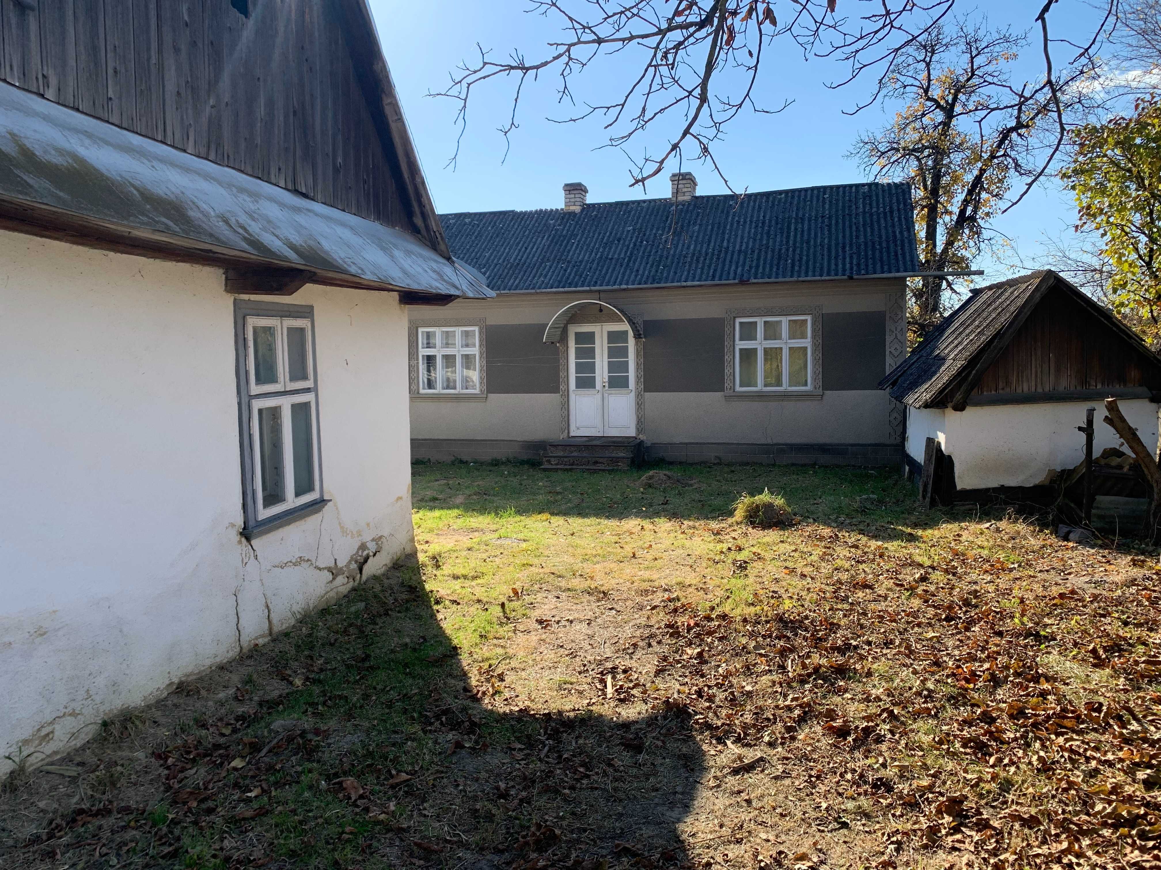 Два будинки на одному обійсті 40,м кв.+31м кв. 0.14га вул. Сінна.