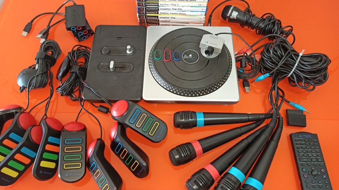 Pack PlayStation 2 - Dj hero mesa - buzz - singstar 
Guitar hero 
Bizz