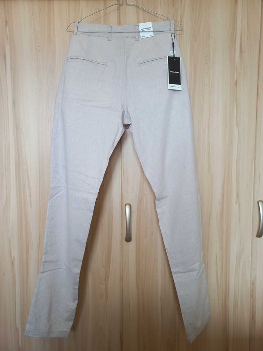 [Nowe z metką] Męskie kremowe spodnie chino Jack & Jones W32 L34