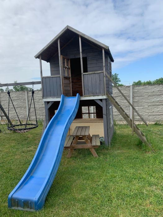 Drewniany domek ogrodowy dla dzieci