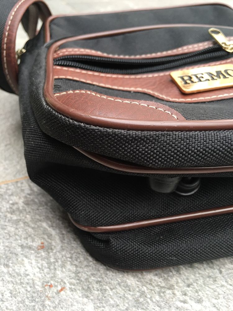 bolsa de homem com alça.