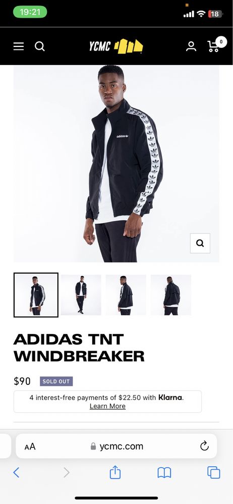 Олімпійка Adidas з лампасами.