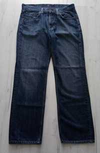 Męskie spodnie jeansowe TOMMY HILFIGER rozmiar L jeans W33 L32