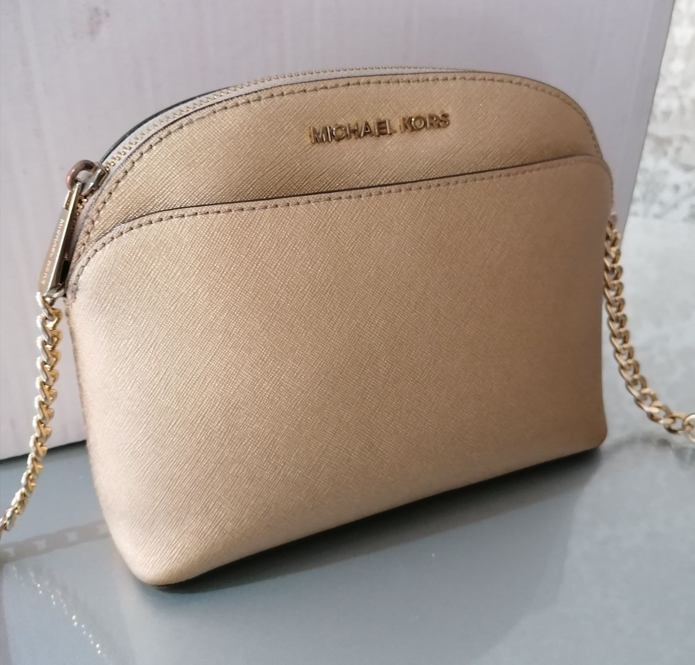 Mala Michael Kors dourada