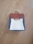 Mochila nova tricolor