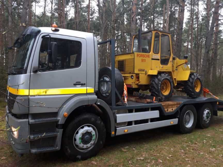 Transport maszyn budowlanych wózków usługi transportowe laweta