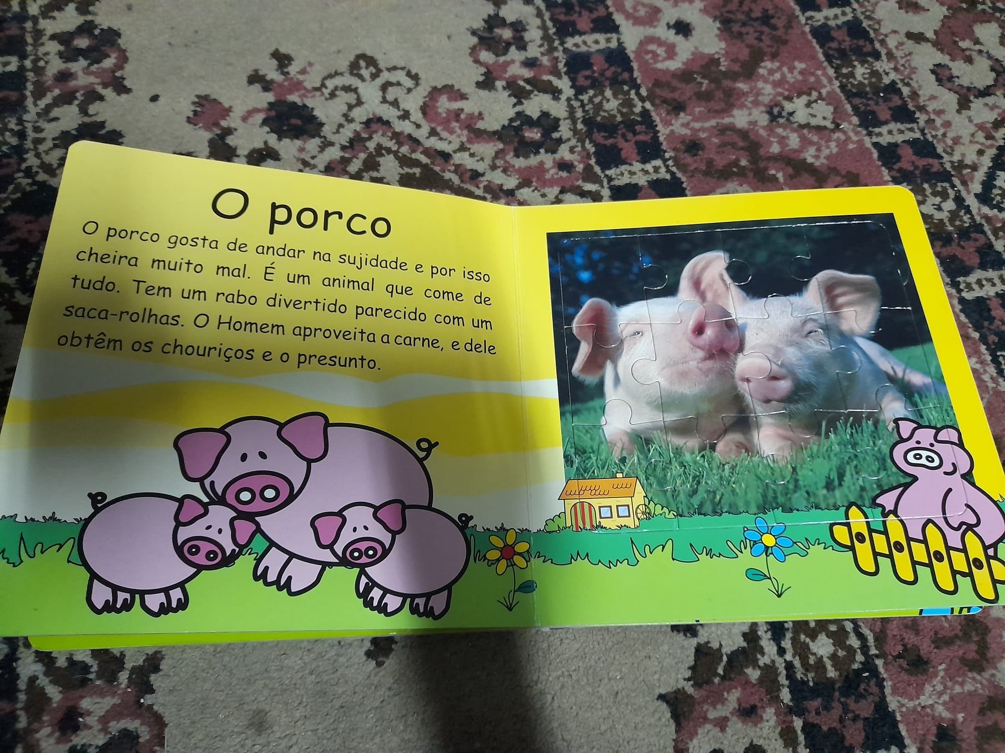 Livro de animais com puzzle