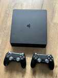 PlayStation 4 Slim 1TB + 2 pady + 10 gier