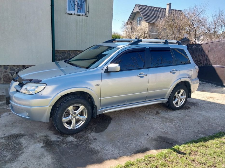Mitsubishi outlander 1 покоління 2008 рік