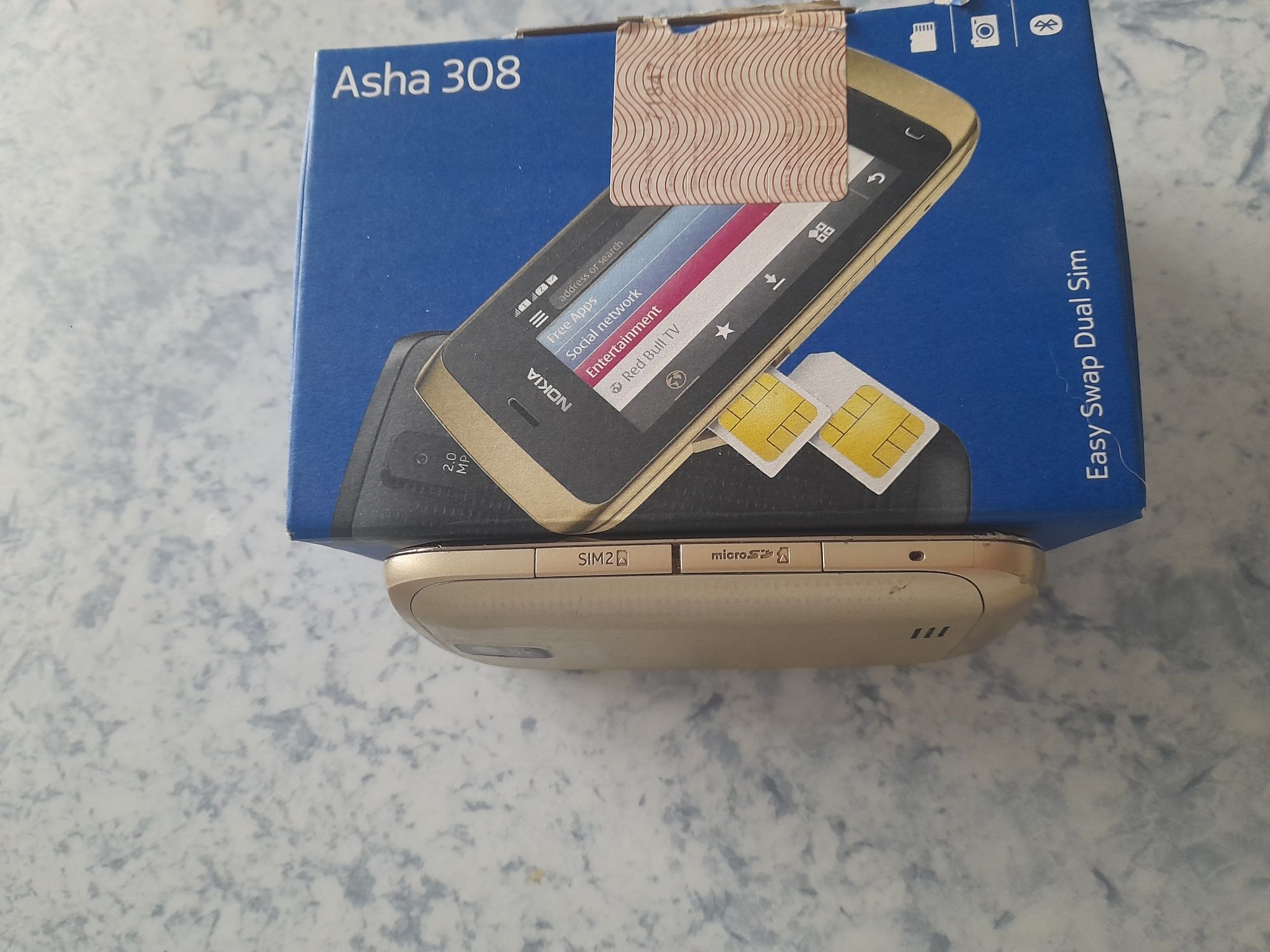 Nokia asha 308 (сенсорный).