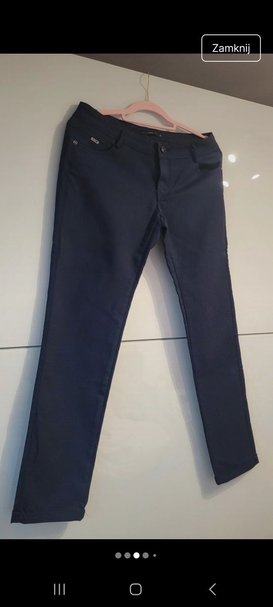Eleganckie spodnie granatowe 40-44 nowe bez metki