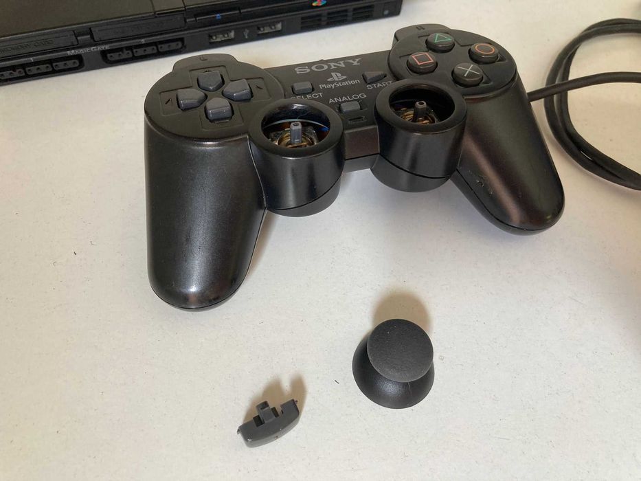 Comando e PS2 Slim para Reparação