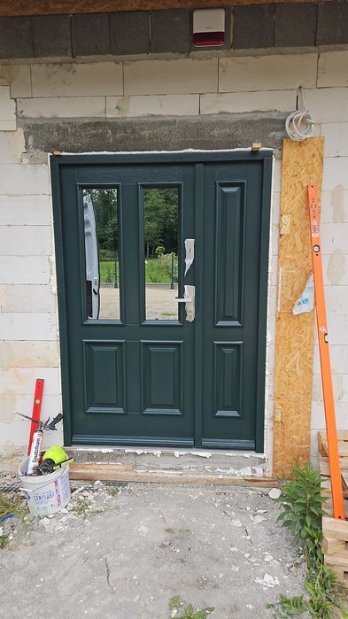 Drzwi zewnętrzne drewniane dębowe ral 3020 z montażem producent