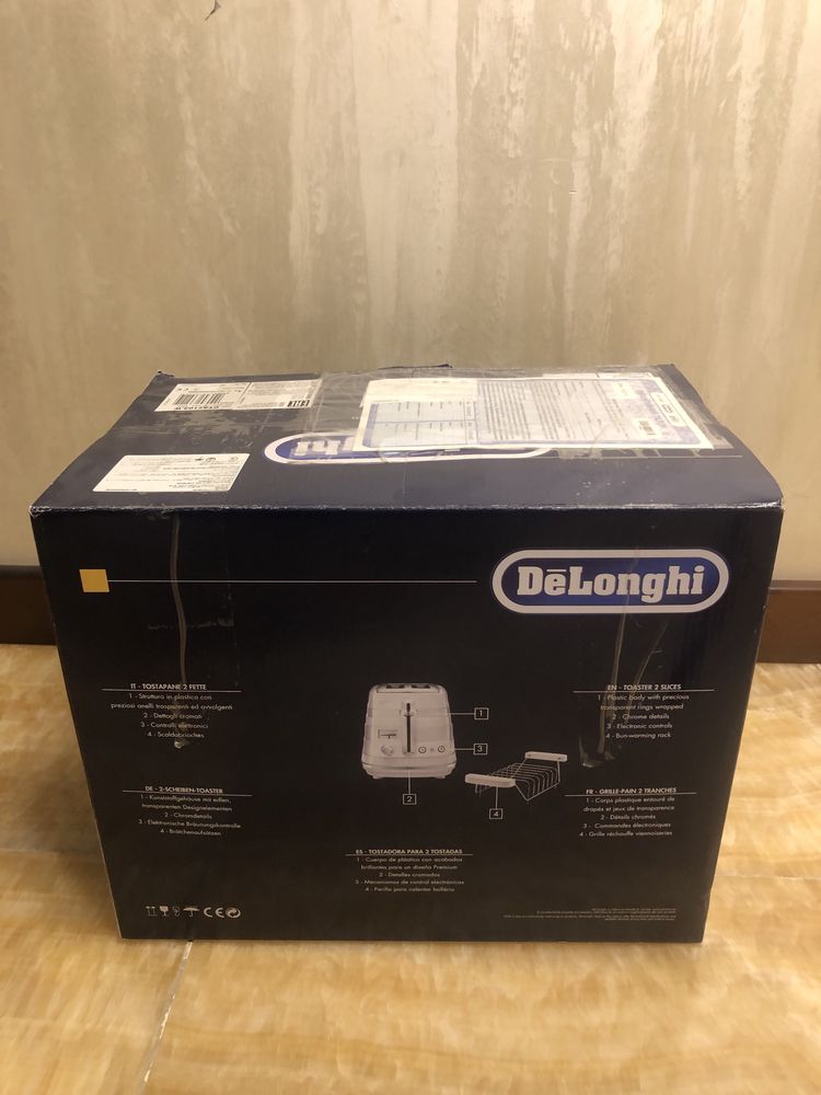 Тостер Delonghi