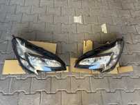 Lampy relfektory przednie Opel Corsa E 14-