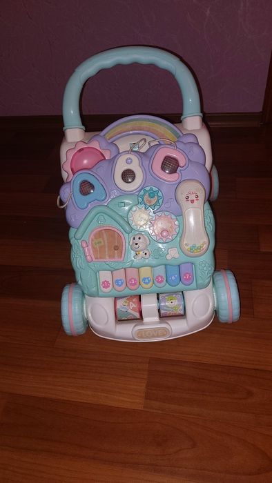 Дитяча каталка-ходунки