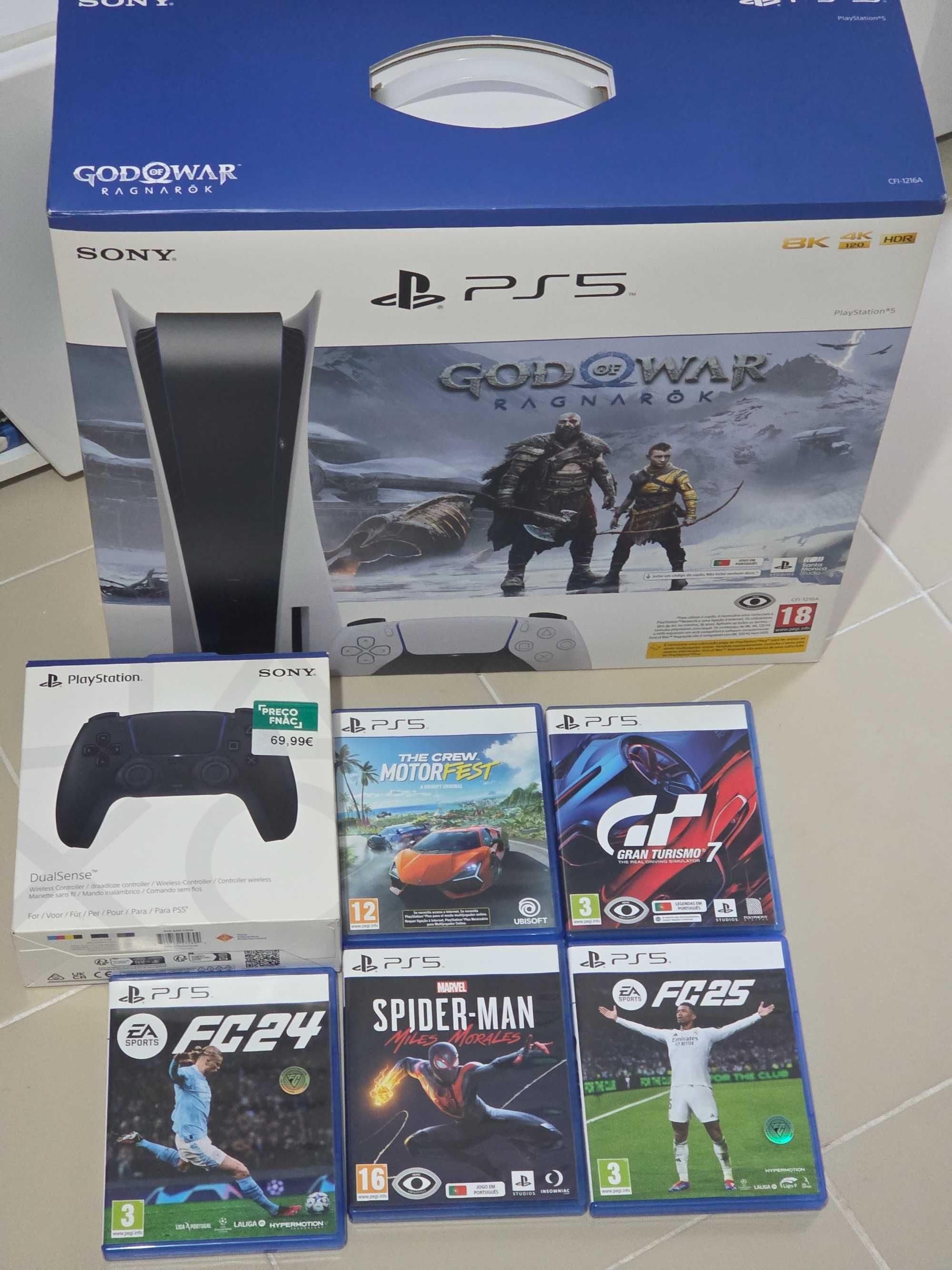 Playstation 5 com 5 jogos + 2 comandos seg.garantia dezembro 2028