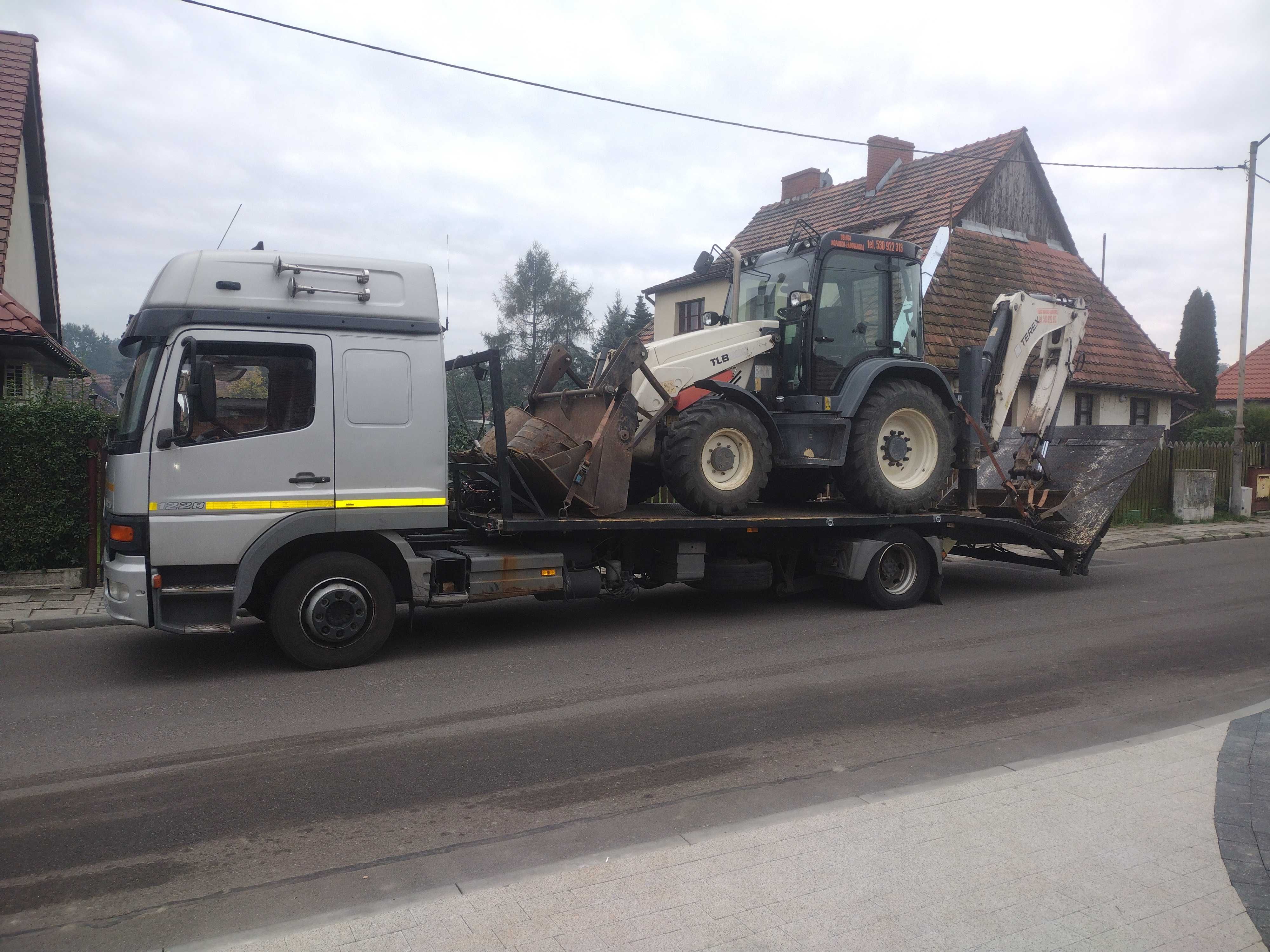 pomoc drogowa laweta  transport pojazdów maszyn rolniczych budowlanych