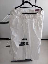 Białe spodnie z metką
