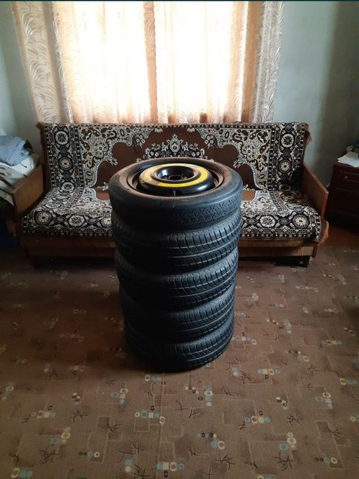 Продам Оригінальні тітанчікі,з Новою німецькою резиною.