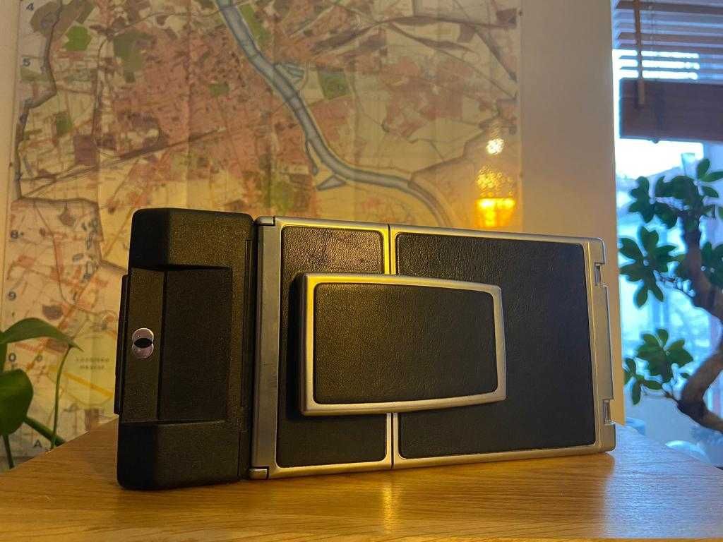 Aparat Polaroid SX-70 SONAR + Statyw + Lampy błyskowe