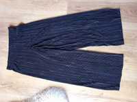 Czarne szerokie spodnie-kuloty 134-140