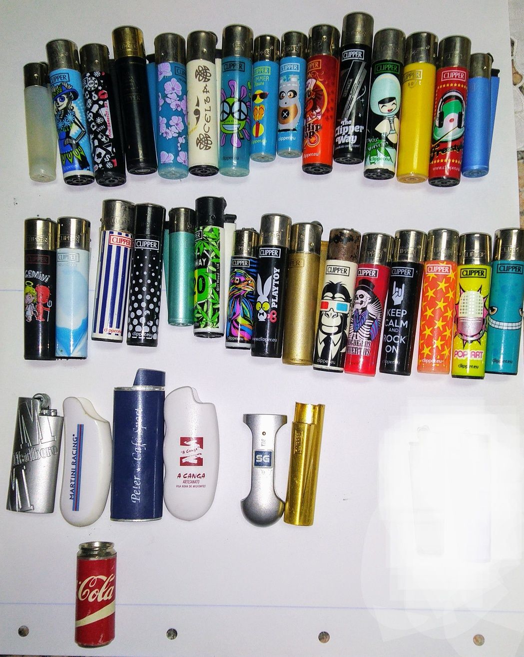 Isqueiros Clipper e capas