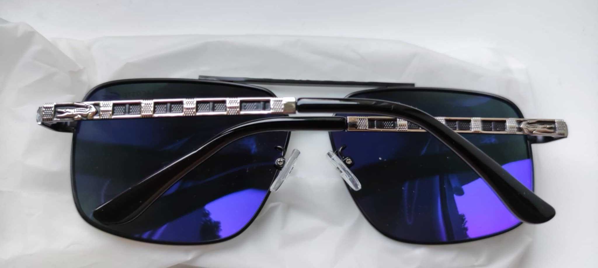 Nowe przeciwsłoneczne okulary męskie Lacoste