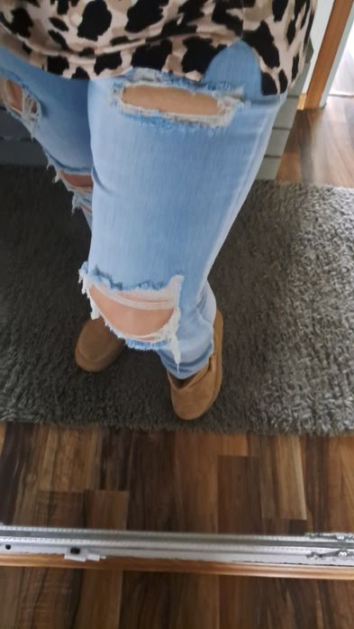 Spodnie z dziurami 48/52