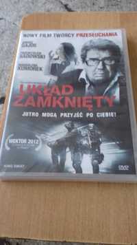 Filmy DVD: Układ zamknięty, Family Man, Ścigani