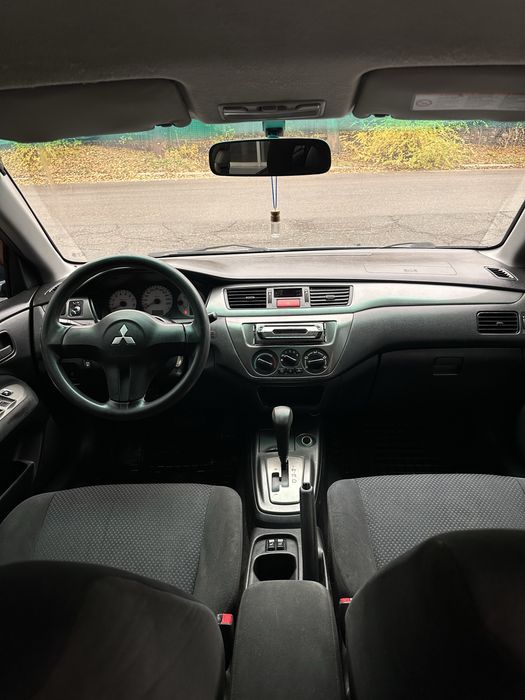 Продам лансер 9 автомат газ/бензин рестайлинг