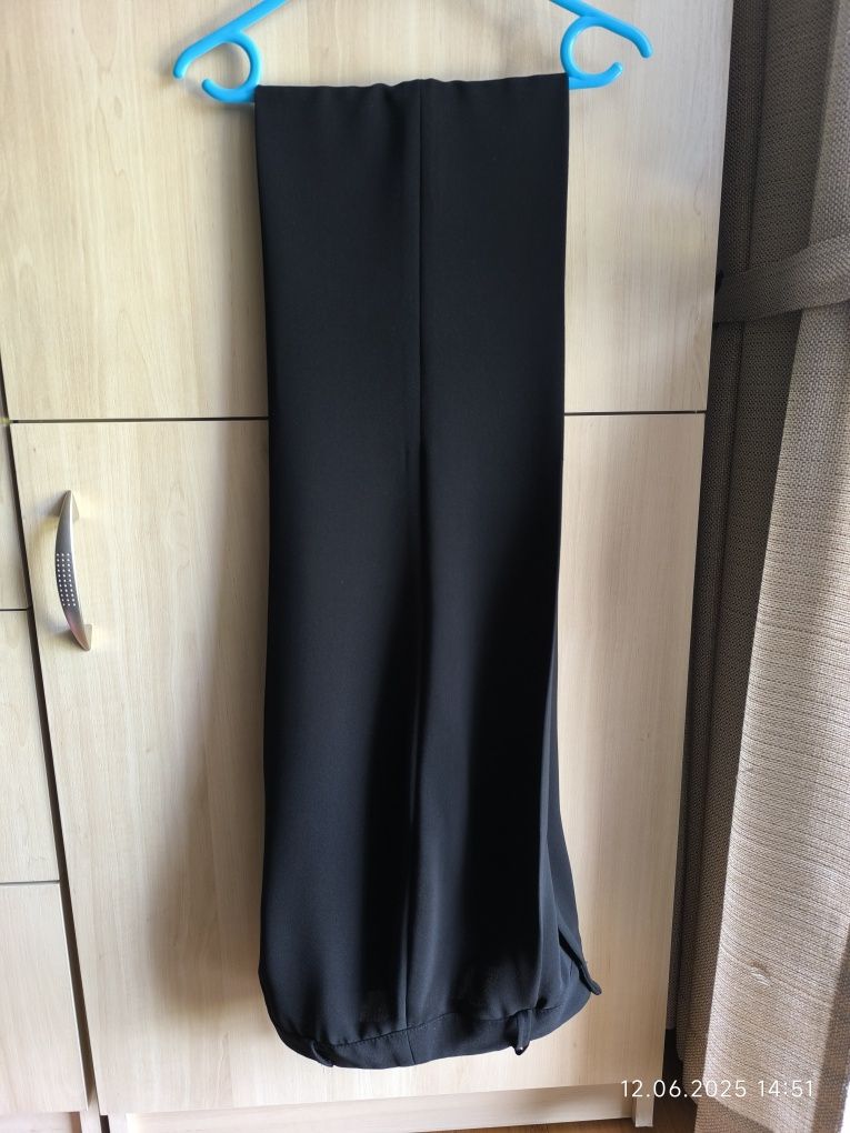 Czarne eleganckie spodnie szerokie migawki dzwony 34