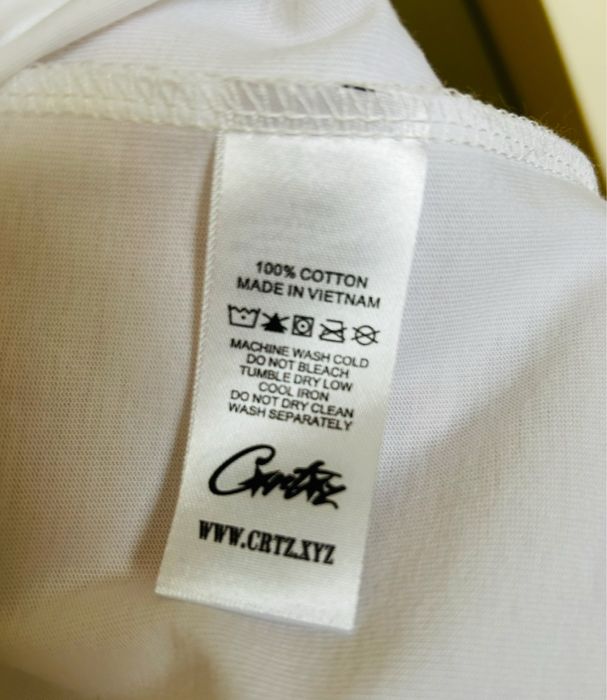 Biała koszulka Corteiz z różowym napisem rozmiar M jak nowa