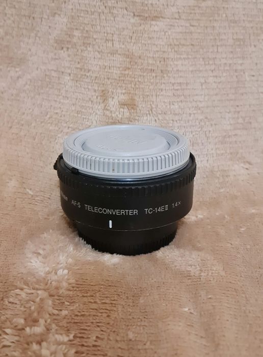 NIKON TELECONVERTER TC 14E II 1.4x

Excelente estado geral, sem  mar