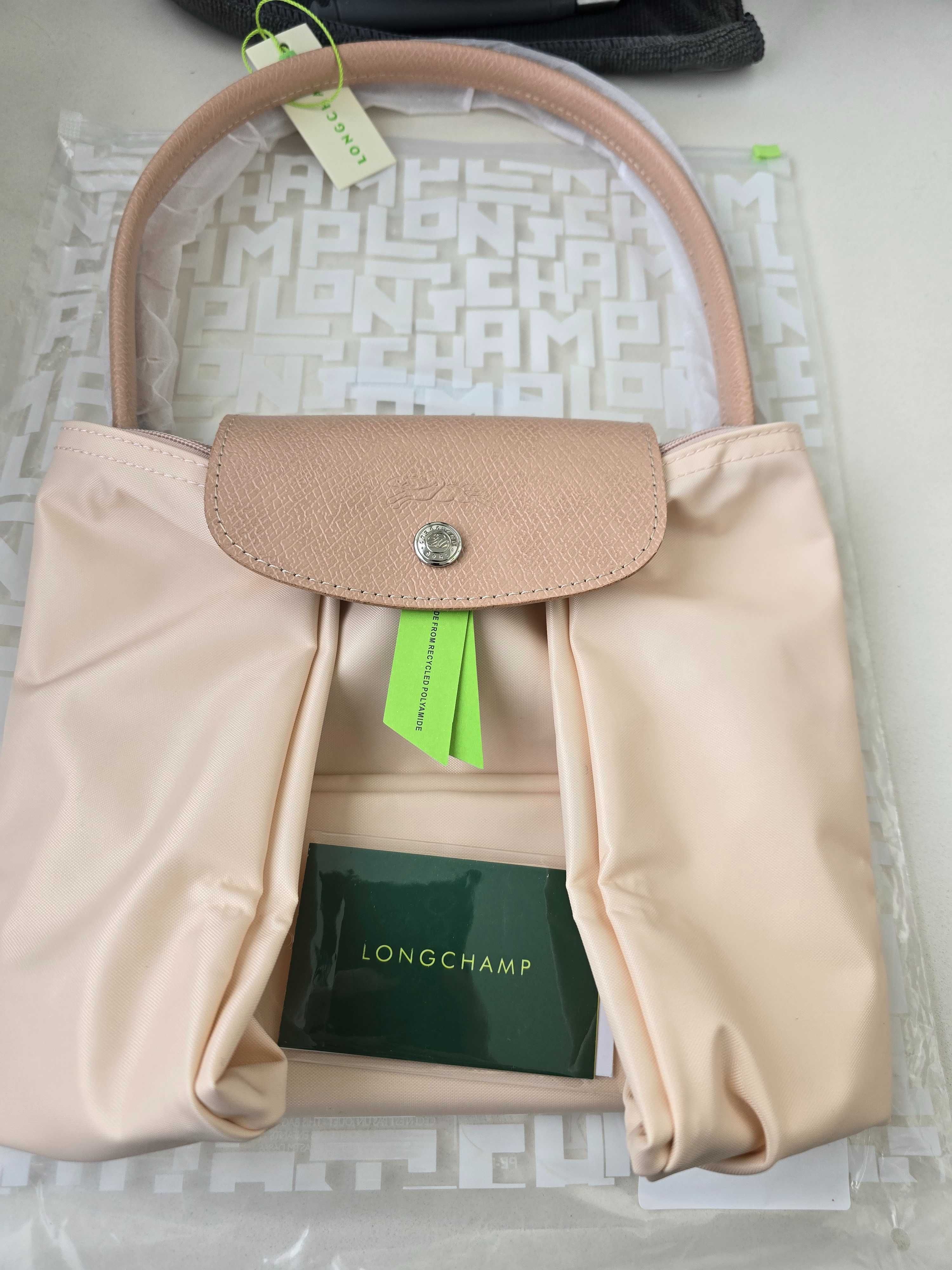 Mala Longchamp em rosa claro. Tamanho L.