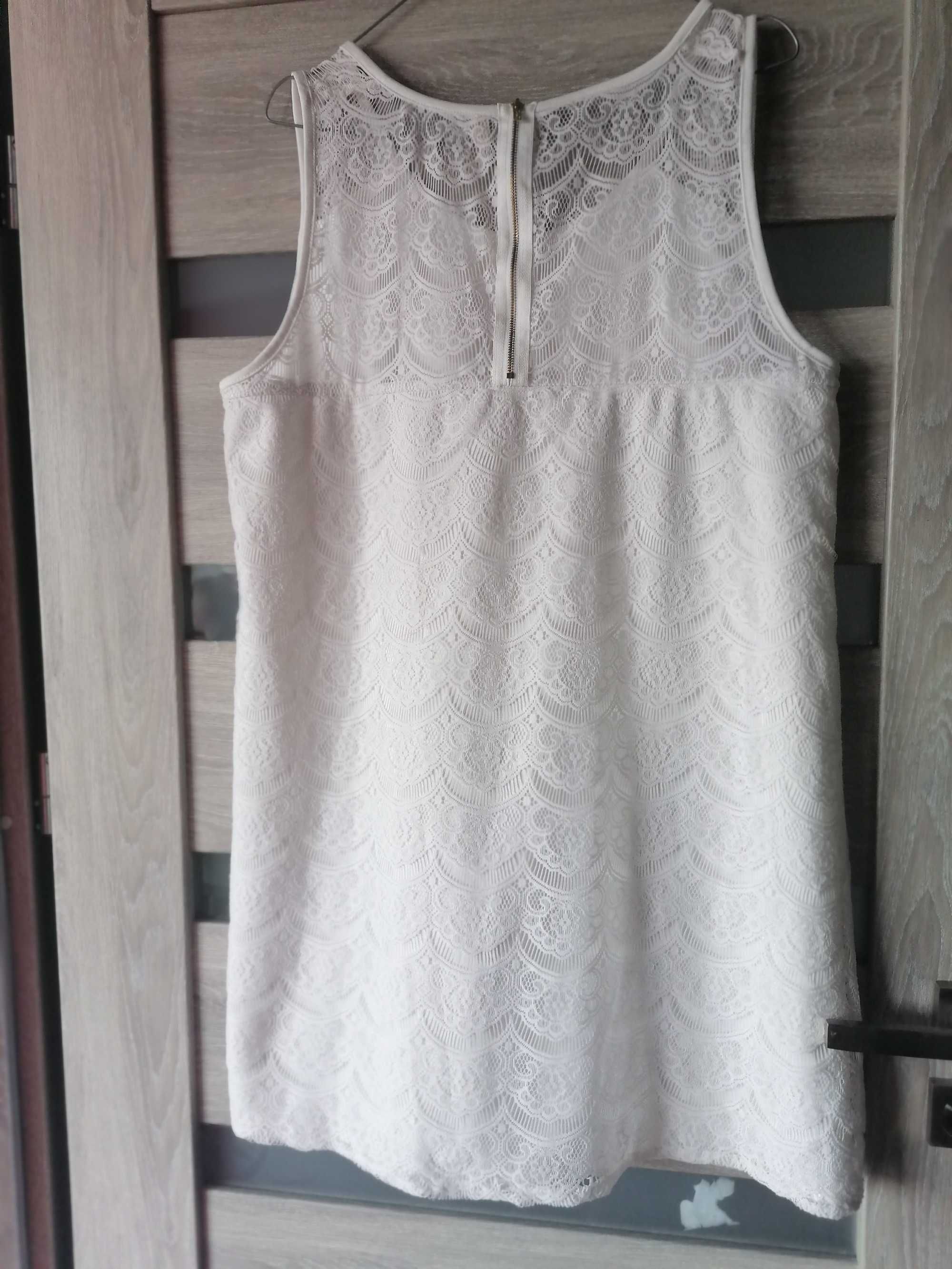 Biała sukienka koronkowa 44 litera A