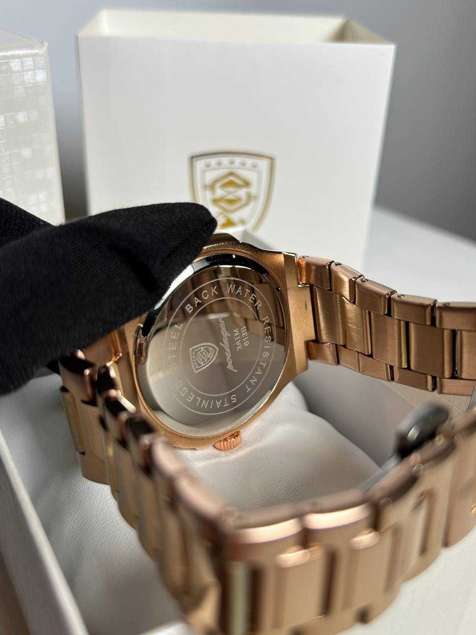 Часы Poedagar Nautilus золотые с черным циферблатом