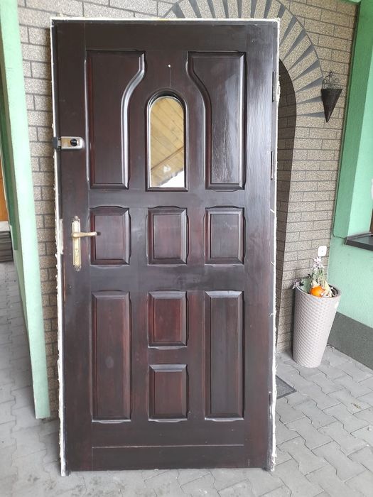 Drzwi zewnętrzne drewniane, solidne, nowe zamki
