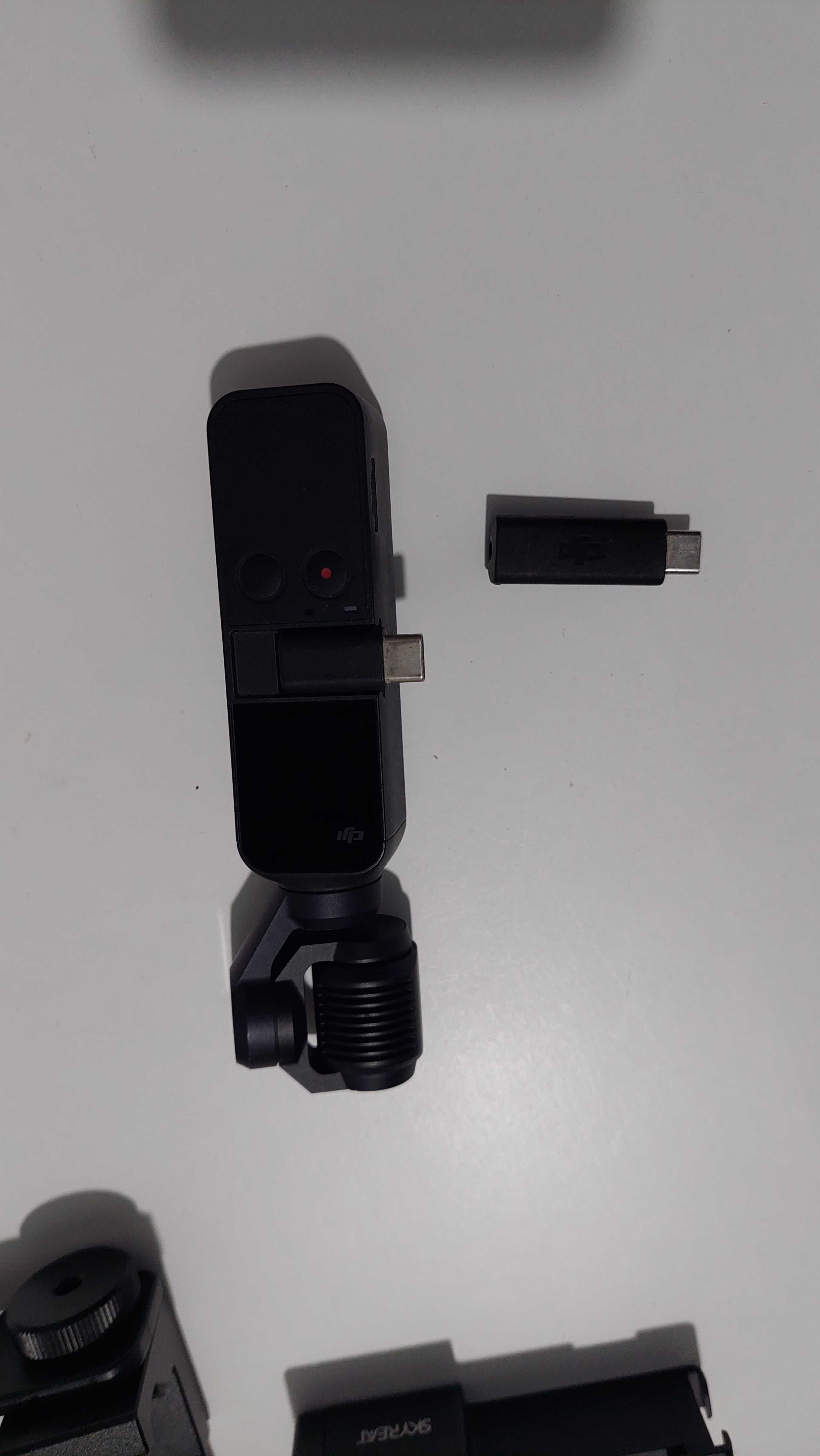 DJI osmo pocket (lente partida) c/ cx estanque e mts acessórios