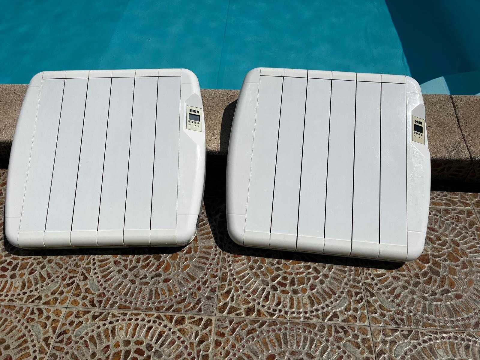 Vendo aquecedores de parede em perfeito estado de funcionamento.