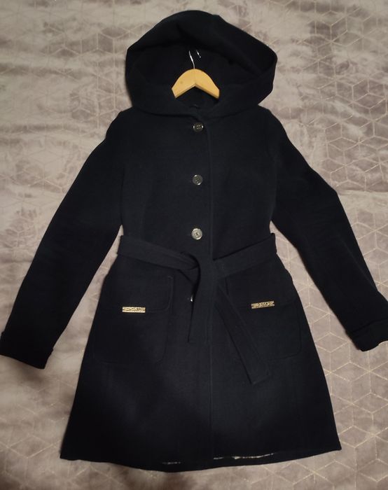 Осіннє жіноче пальто